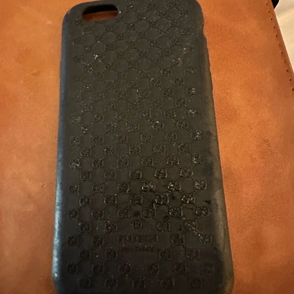 iPhone 6-Plus Gucci case and Gucci SKU on original box.